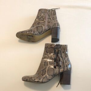 Bella vita size 7.5 snakeskin booties with lace up sides. 2.5inch-ish heel